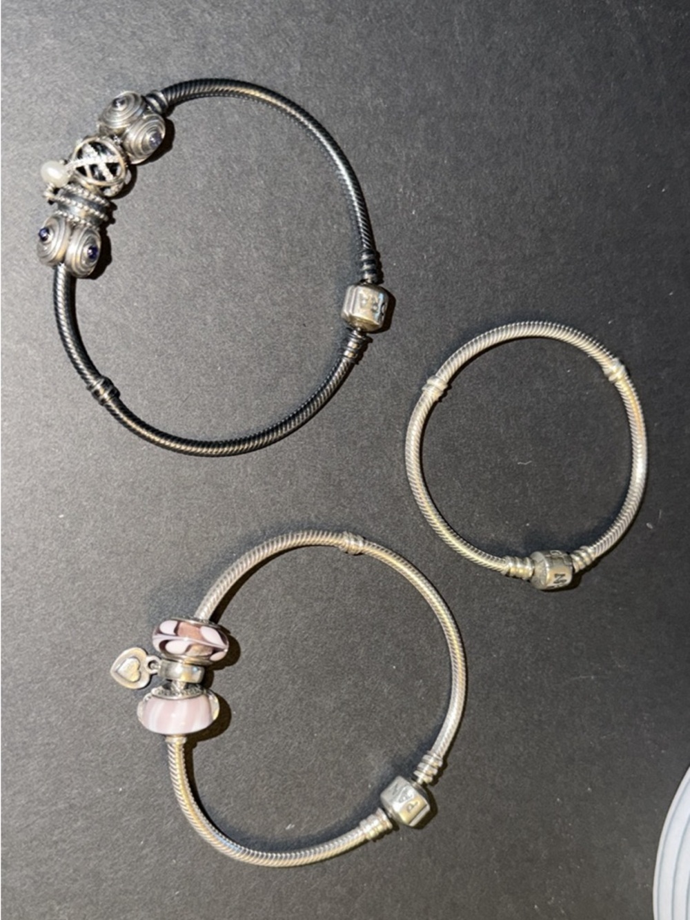 3 Pandora Moments Bracelets With 7 Pandora Charms